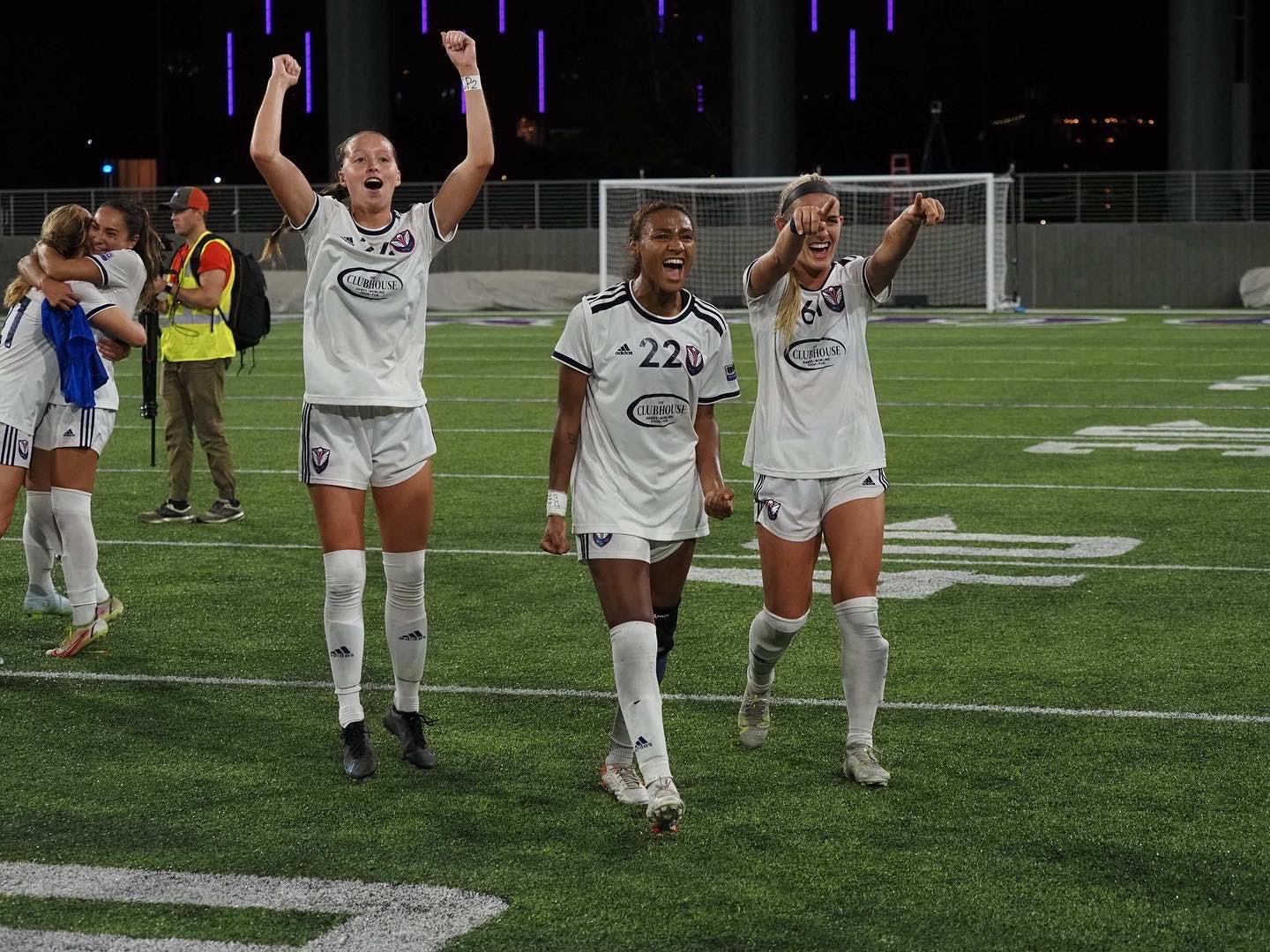 Jhenesis and teammates celebrating championship win 