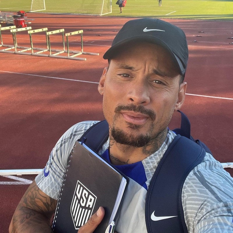 Jermaine Jones holding a US soccer notebook